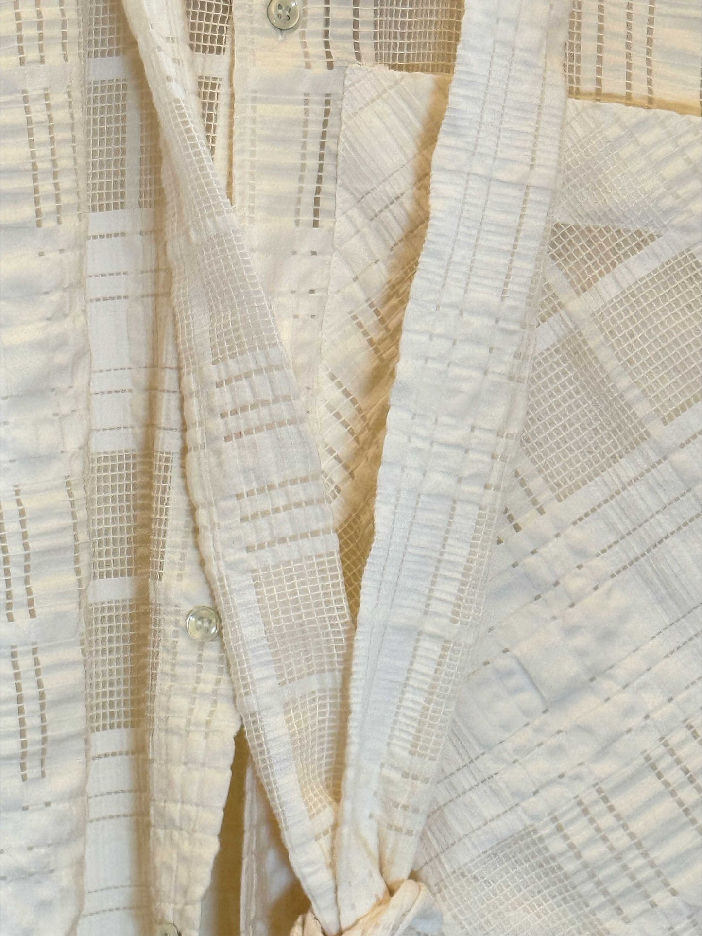 détail tissu et cravate
